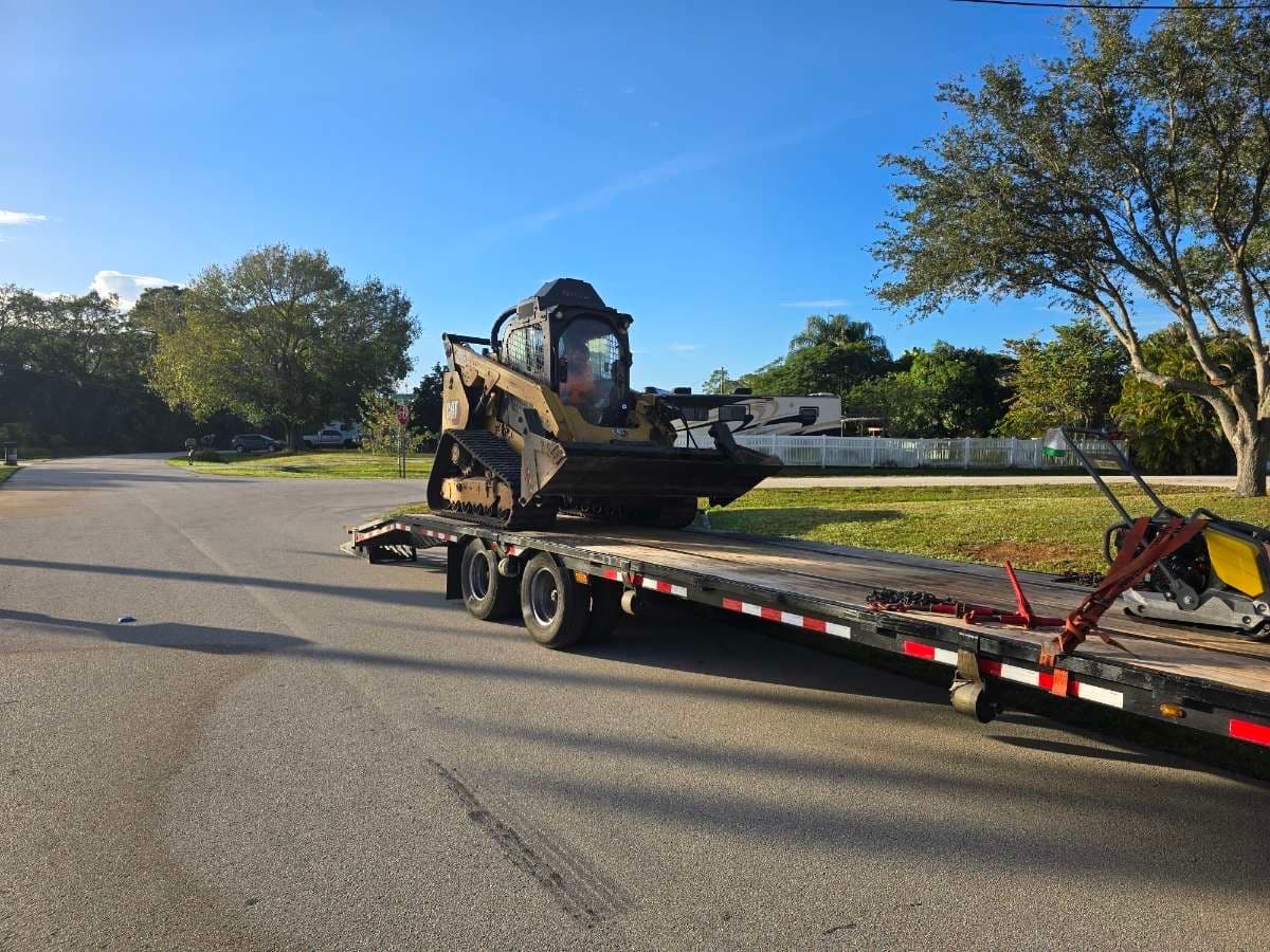 Track Loader in Action for Gravel Pad Installation in Port St. Lucie